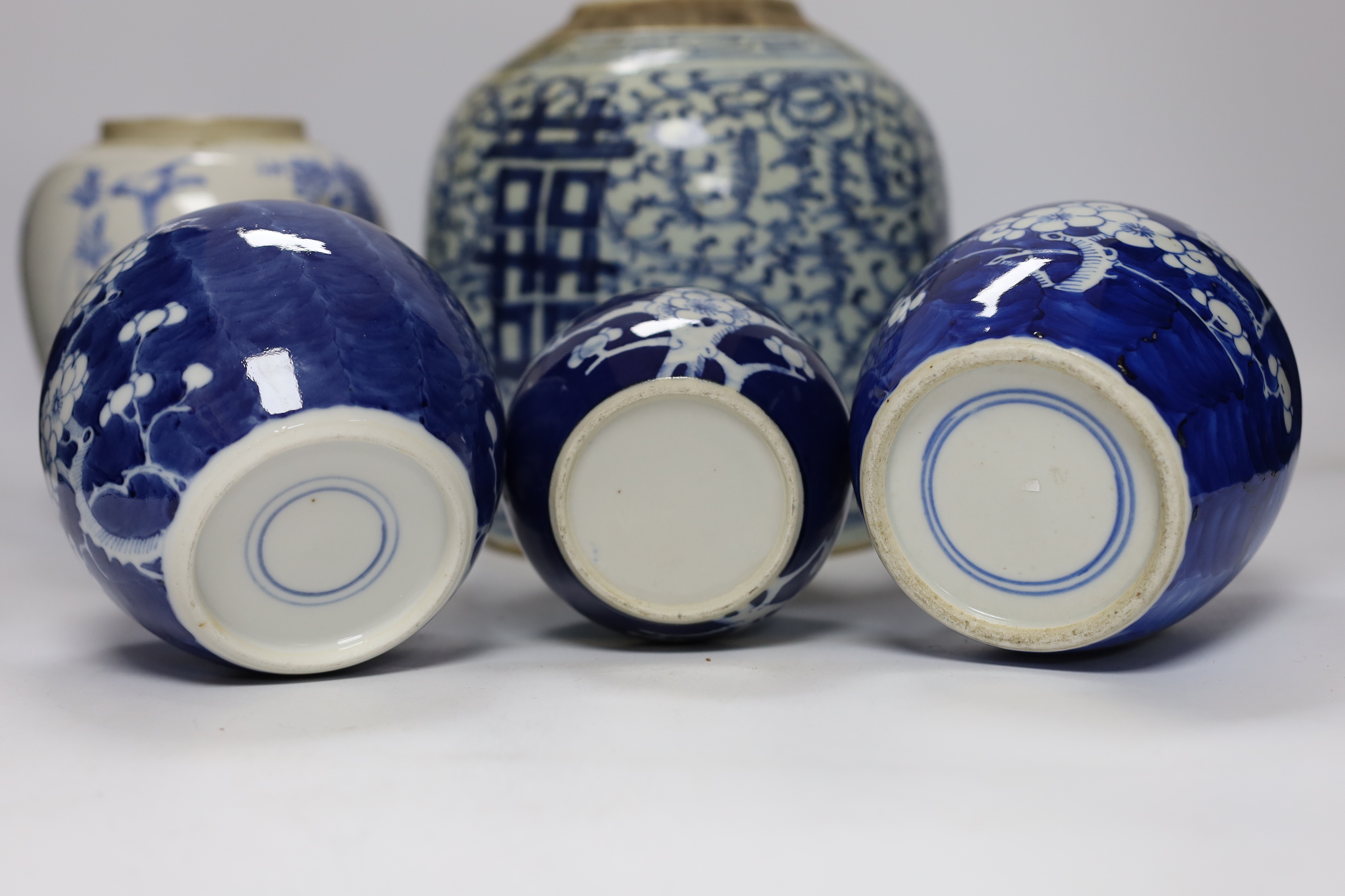 A group of four Chinese blue and white jars and a bowl, together with a similar Japanese jar, tallest 21cm